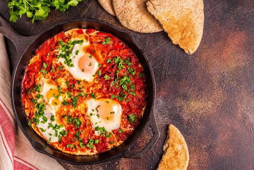 recipe image Shakshuka with garlic pittas