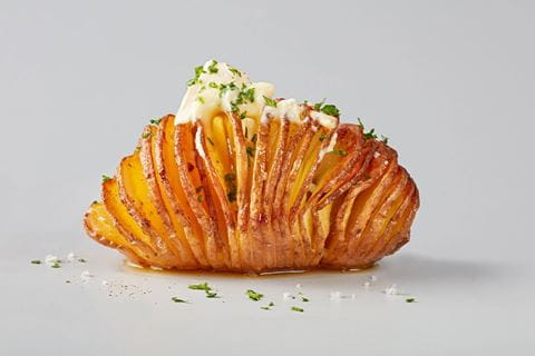 recipe image Smoked Garlic Hasselback Potatoe